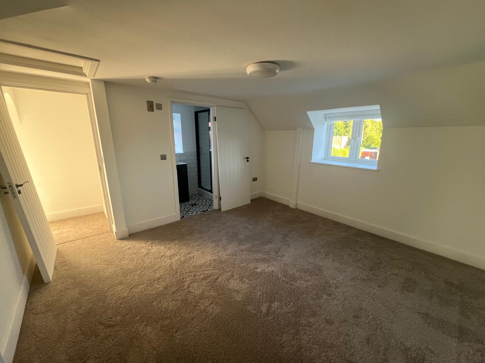 Loft-style room after light refurbishment — London rental